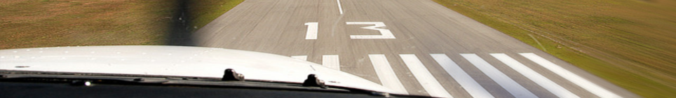 Airplane landing on a runway from the cockpit view. Photo by Tommy Wiklind.