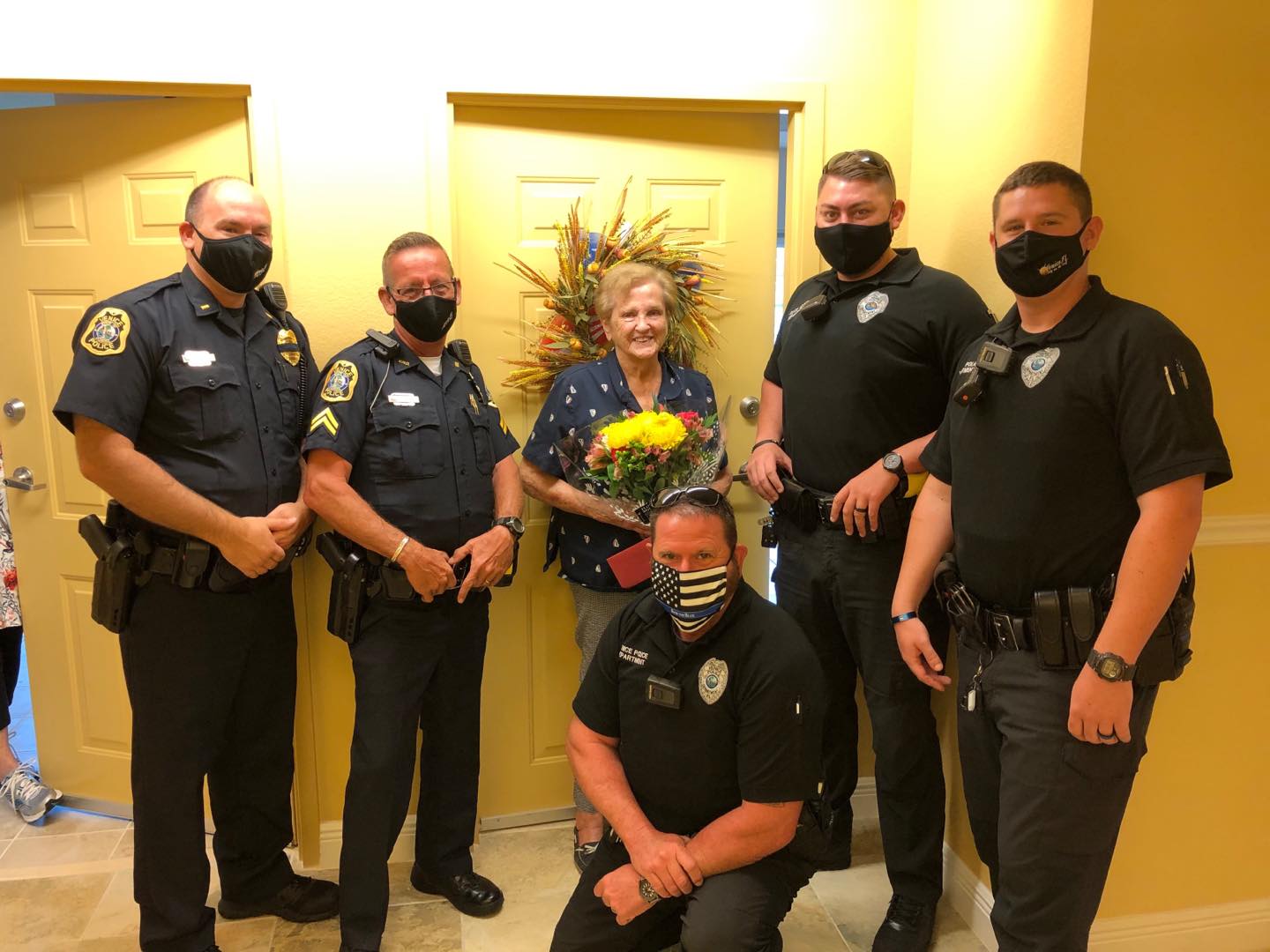 Police Officers with Elderly woman