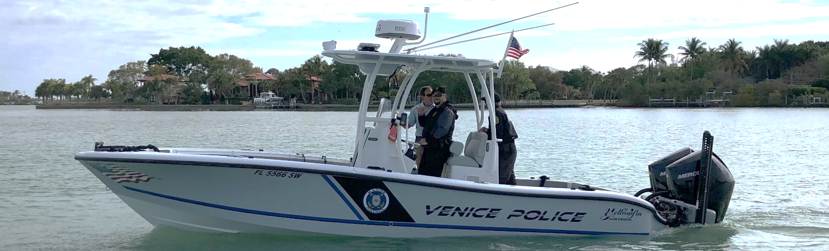 Three VPD Police officers on a Venice Police Department boat